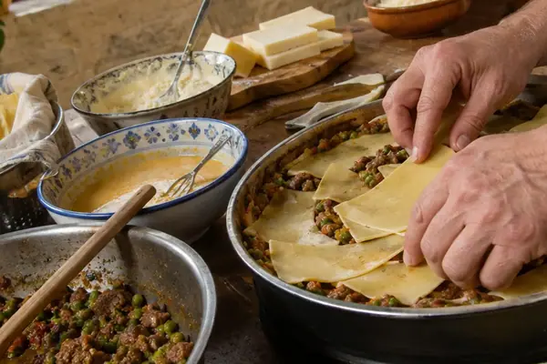 Assembling a Traditional Maltese Timpana for Sunday Family Lunch